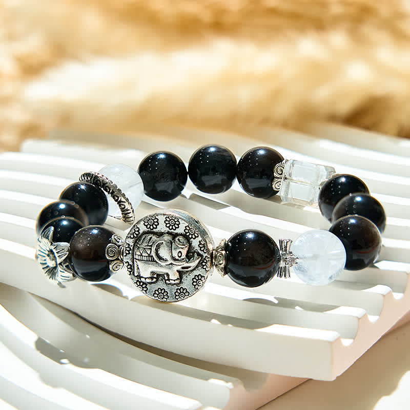 Pulsera con colgante de elefante de metal con cuentas de obsidiana plateada de Olivenorma