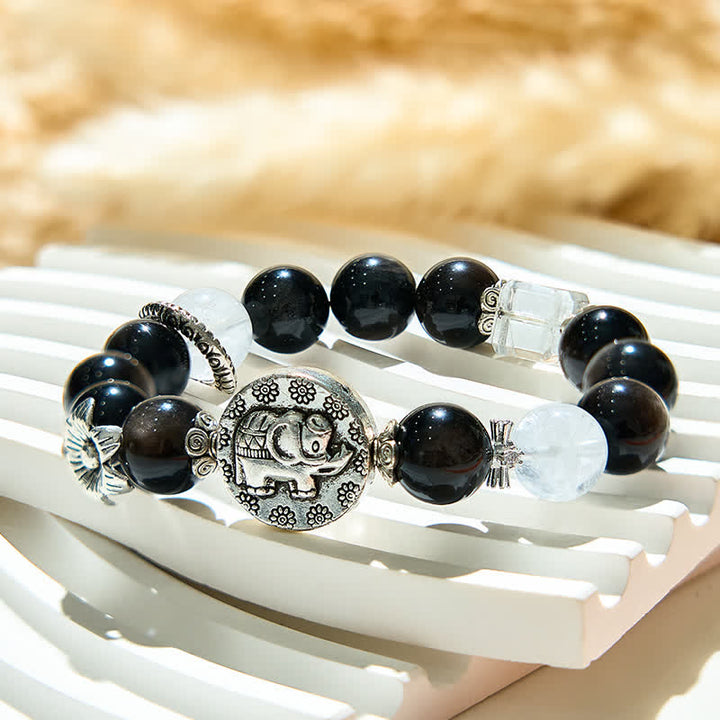 Pulsera con colgante de elefante de metal con cuentas de obsidiana plateada de Olivenorma
