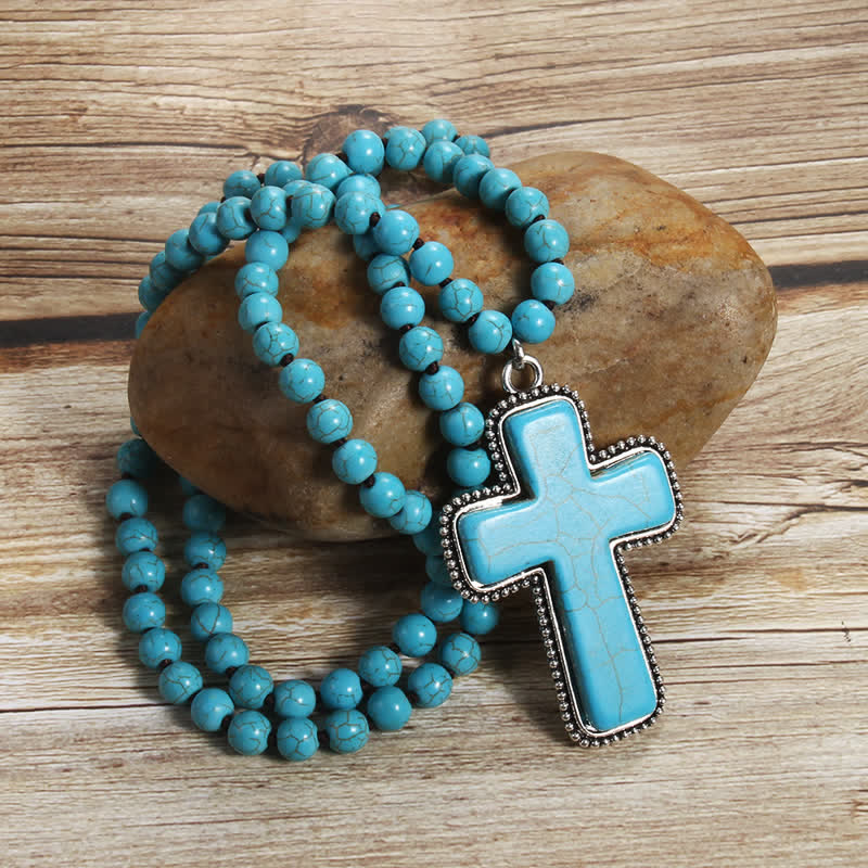 Collar con colgante en forma de cruz de turquesa azul y blanca de 8 mm de Olivenorma