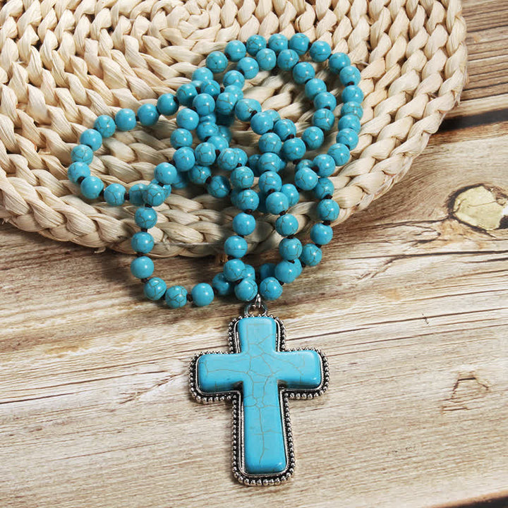 Collar con colgante en forma de cruz de turquesa azul y blanca de 8 mm de Olivenorma