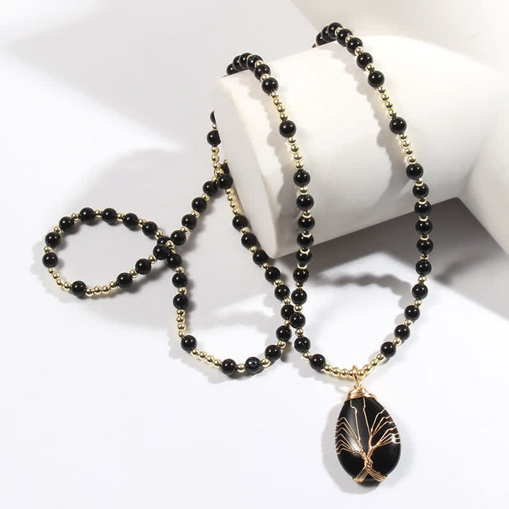 Collar con colgante de árbol de la vida y cuentas de piedra de Olivenorma