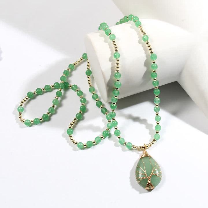 Collar con colgante de árbol de la vida y cuentas de piedra de Olivenorma