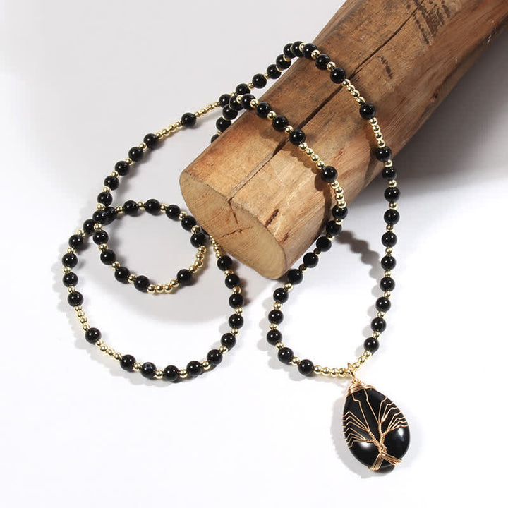 Collar con colgante de árbol de la vida y cuentas de piedra de Olivenorma