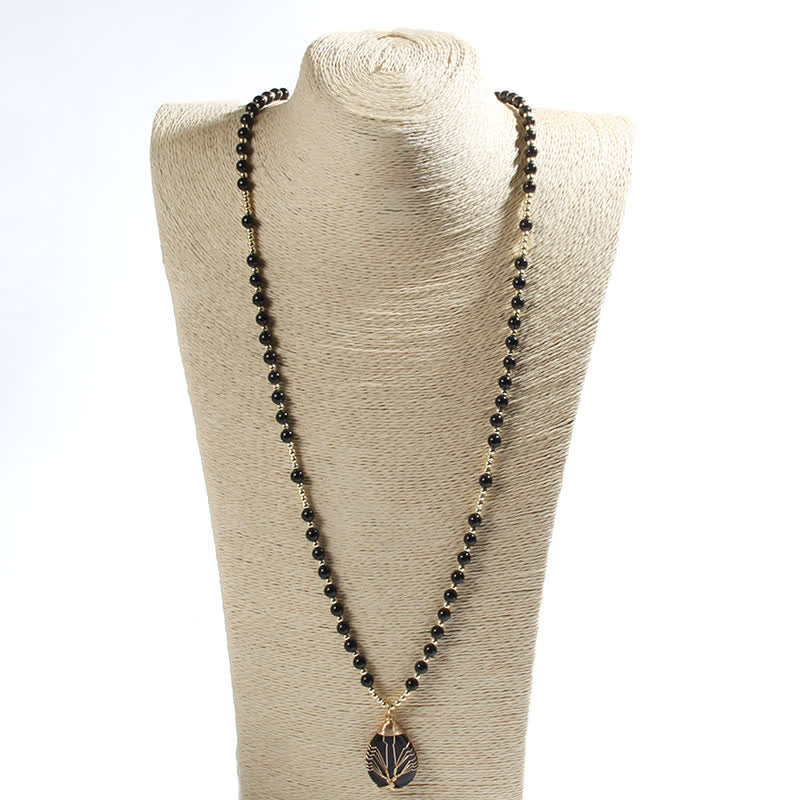 Collar con colgante de árbol de la vida y cuentas de piedra de Olivenorma