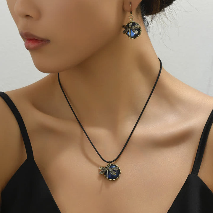 Conjunto de joyas con colgante de libélula con topacio azul incrustado de Olivenorma