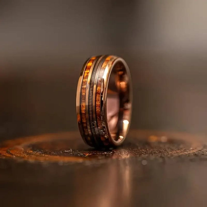 Cuerda de guitarra Olivenorma y anillo de barril de whisky quemado