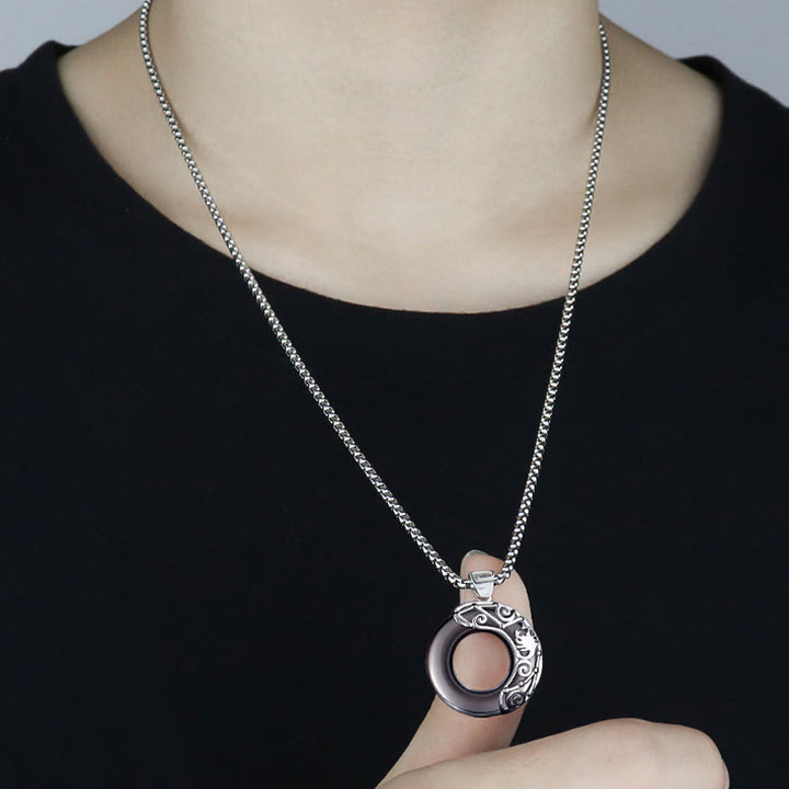Colgante de obsidiana natural con el zodíaco de Olivenorma
