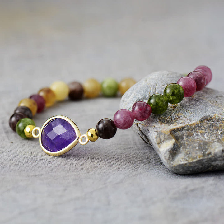 Pulsera de cuentas de turmalina y amatista natural de Olivenorma 