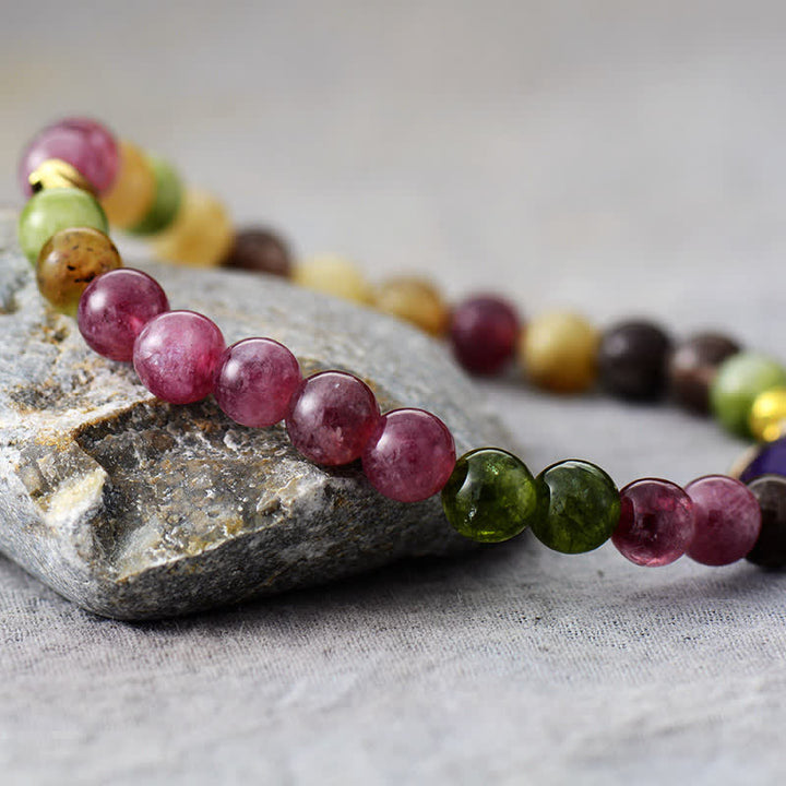 Pulsera de cuentas de turmalina y amatista natural de Olivenorma 