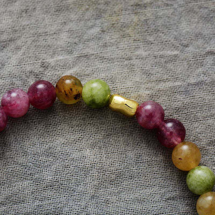 Pulsera de cuentas de turmalina y amatista natural de Olivenorma 