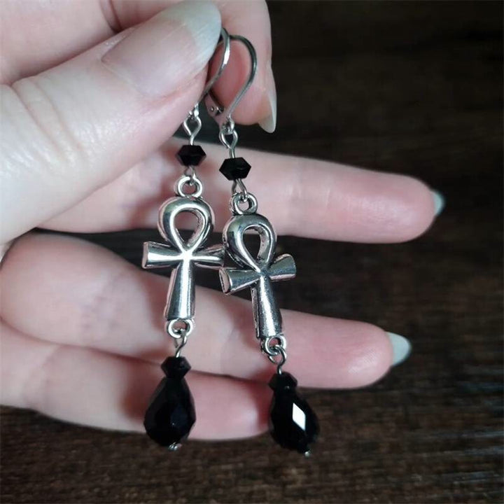 Pendientes con gancho con dije de cruz Ankh de obsidiana de Olivenorma