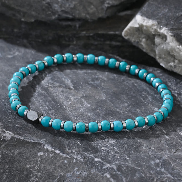 Pulsera de cuentas de turquesa y hematita natural de Olivenorma 