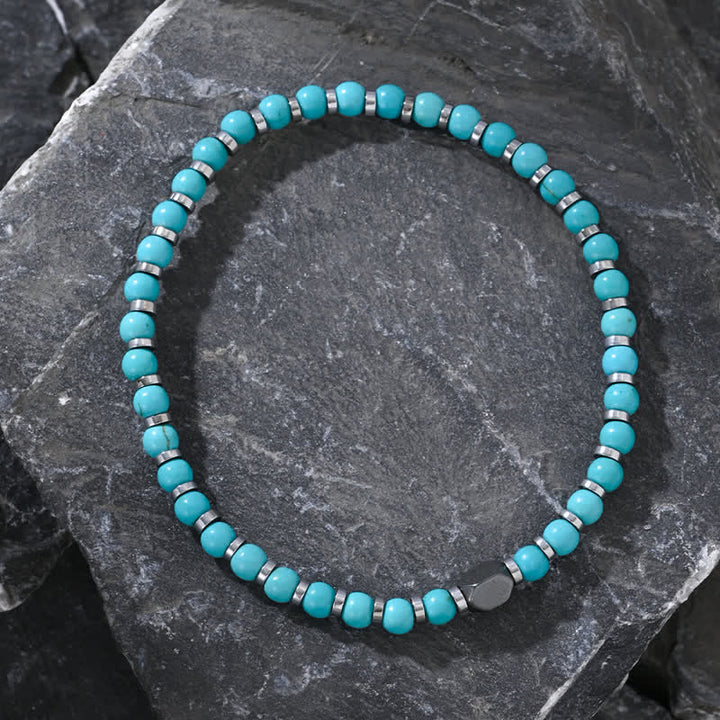 Pulsera de cuentas de turquesa y hematita natural de Olivenorma 