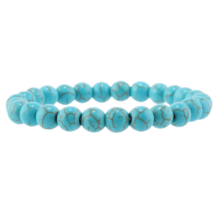 Pulsera trenzada turquesa con cuentas de madera multicapa de Olivenorma