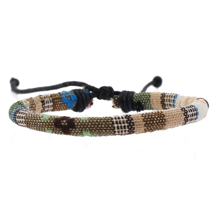Pulsera trenzada turquesa con cuentas de madera multicapa de Olivenorma