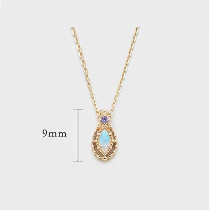 Conjunto de collar, anillo y pendientes con ópalo de Olivenorma Conjunto de joyas con piedras preciosas
