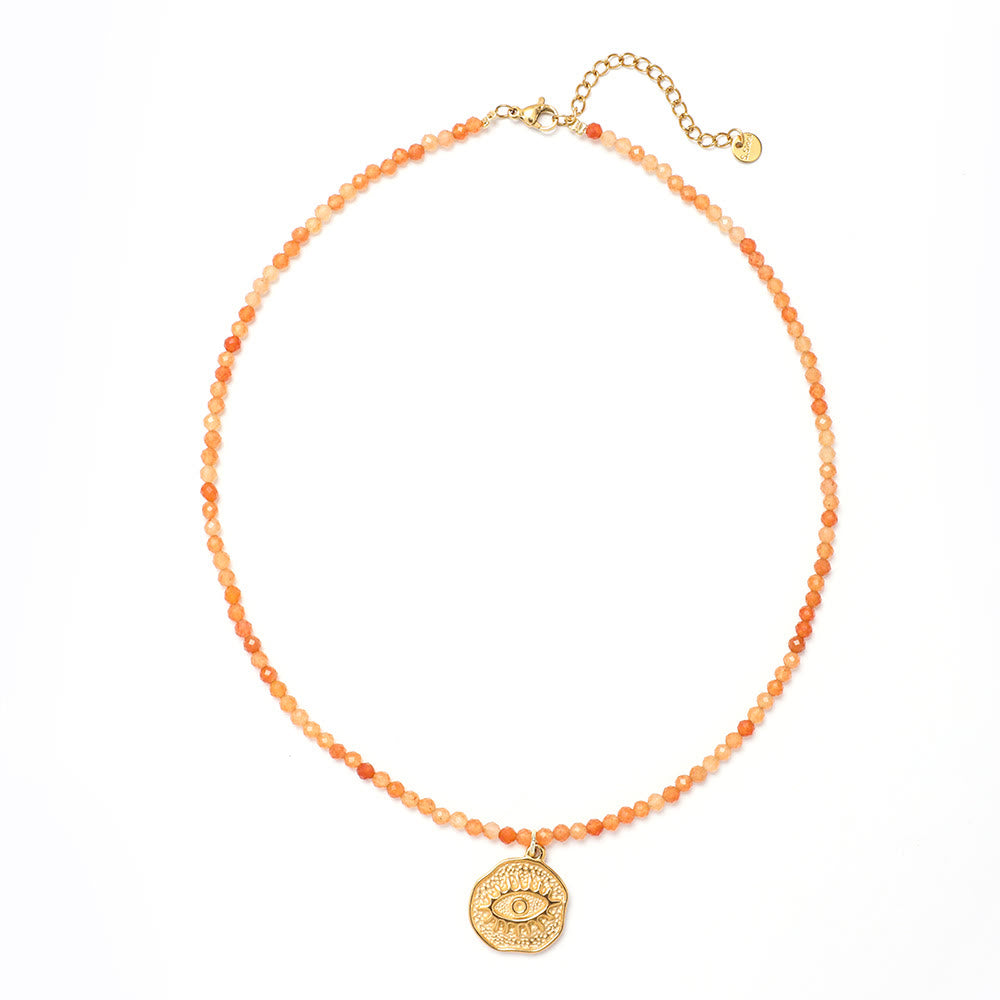 Collar de cuentas con piedras preciosas y sol, luna y estrellas de Olivenorma Boho