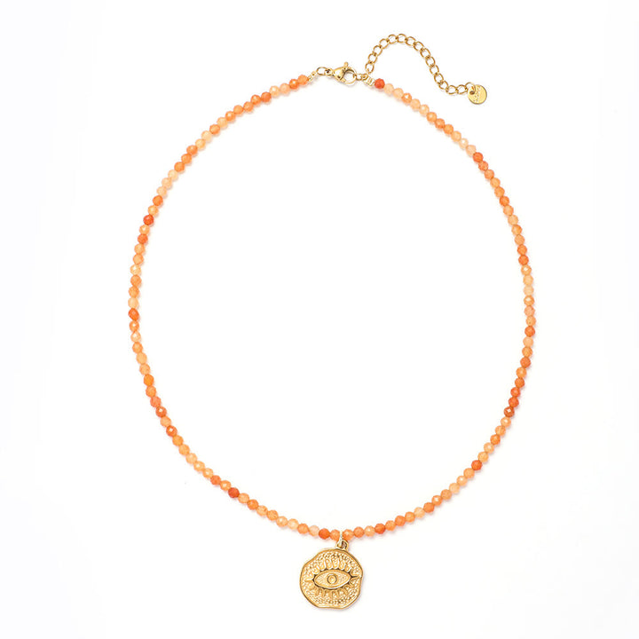 Collar de cuentas con piedras preciosas y sol, luna y estrellas de Olivenorma Boho