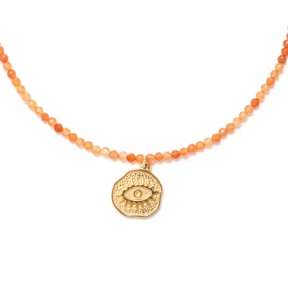 Collar de cuentas con piedras preciosas y sol, luna y estrellas de Olivenorma Boho