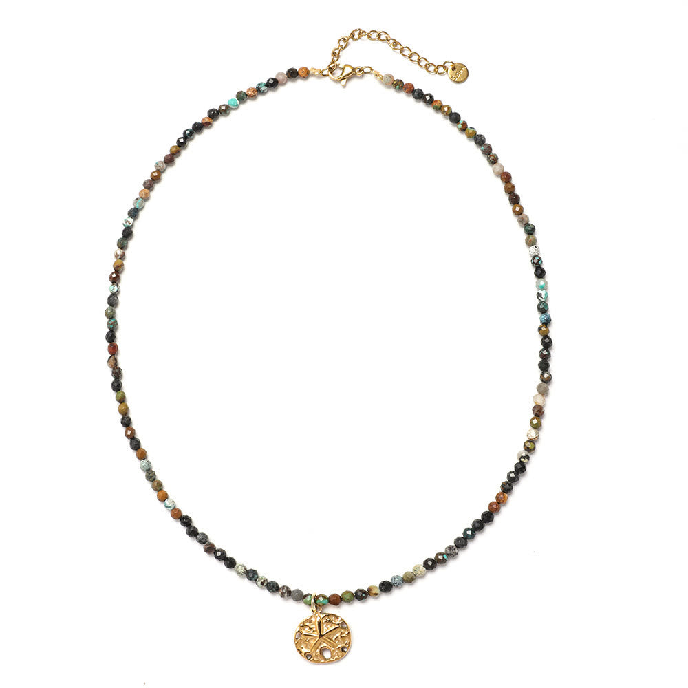 Collar de cuentas con piedras preciosas y sol, luna y estrellas de Olivenorma Boho