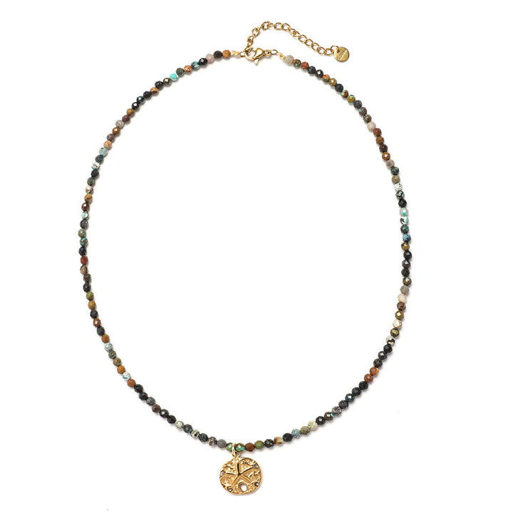 Collar de cuentas con piedras preciosas y sol, luna y estrellas de Olivenorma Boho