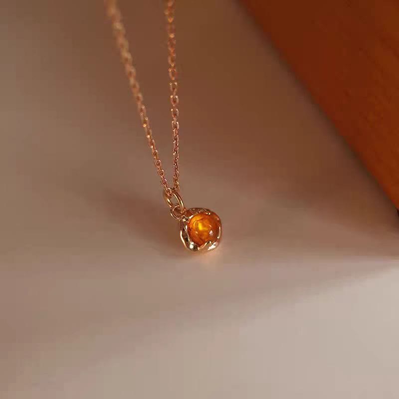 Conjunto de joyas con collar y pendientes de ámbar sencillos y exquisitos de Olivenorma