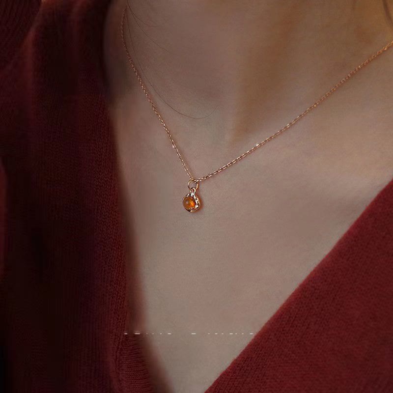 Conjunto de joyas con collar y pendientes de ámbar sencillos y exquisitos de Olivenorma