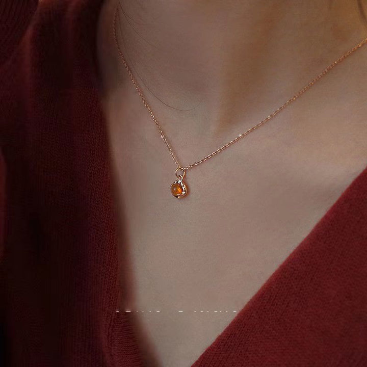 Conjunto de joyas con collar y pendientes de ámbar sencillos y exquisitos de Olivenorma