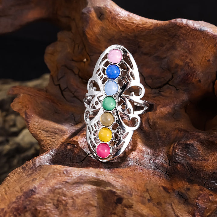 Anillo ajustable hueco de cristal de 7 chakras de Olivenorma