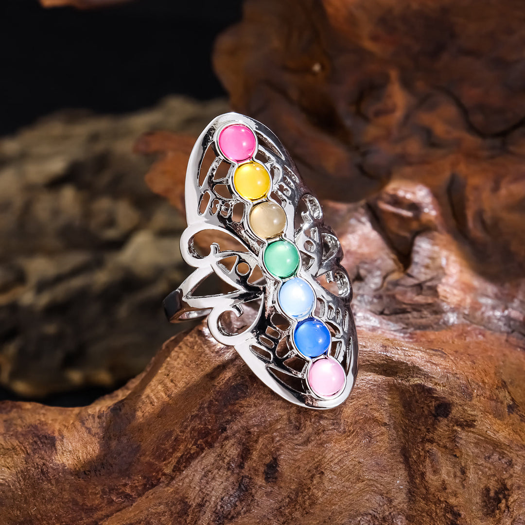 Anillo ajustable hueco de cristal de 7 chakras de Olivenorma