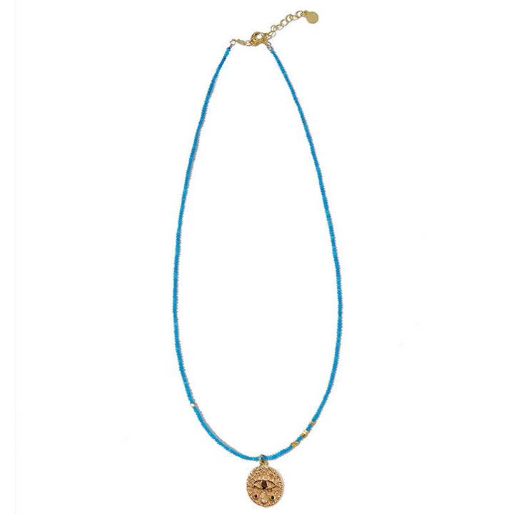 Collar de cuentas turquesas con dije de mal de ojo de Olivenorma