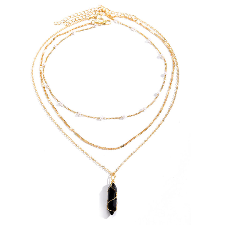 Collar apilado con dijes de prismas de piedras preciosas naturales de Olivenorma