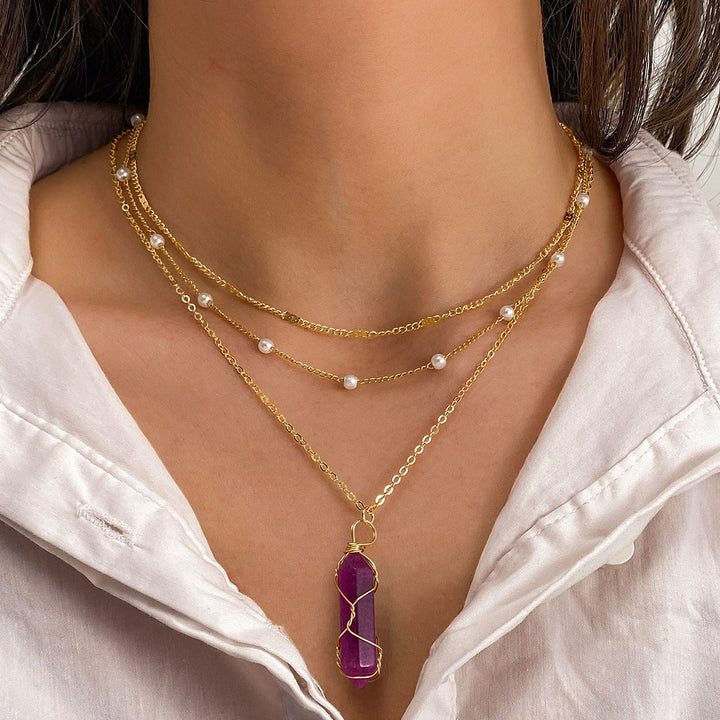 Collar apilado con dijes de prismas de piedras preciosas naturales de Olivenorma