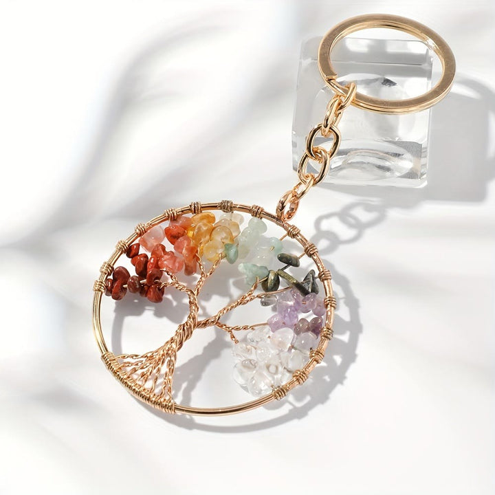 Llavero redondo con el árbol de la vida y piedras preciosas de los 7 chakras de Olivenorma