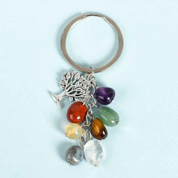Llavero con piedra cruda natural de Olivenorma y árbol de la vida