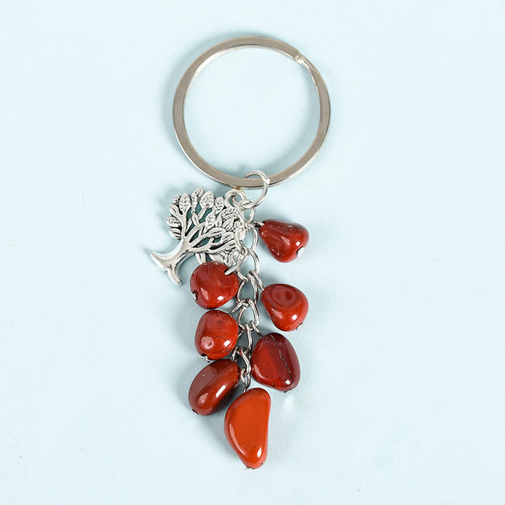 Llavero con piedra cruda natural de Olivenorma y árbol de la vida