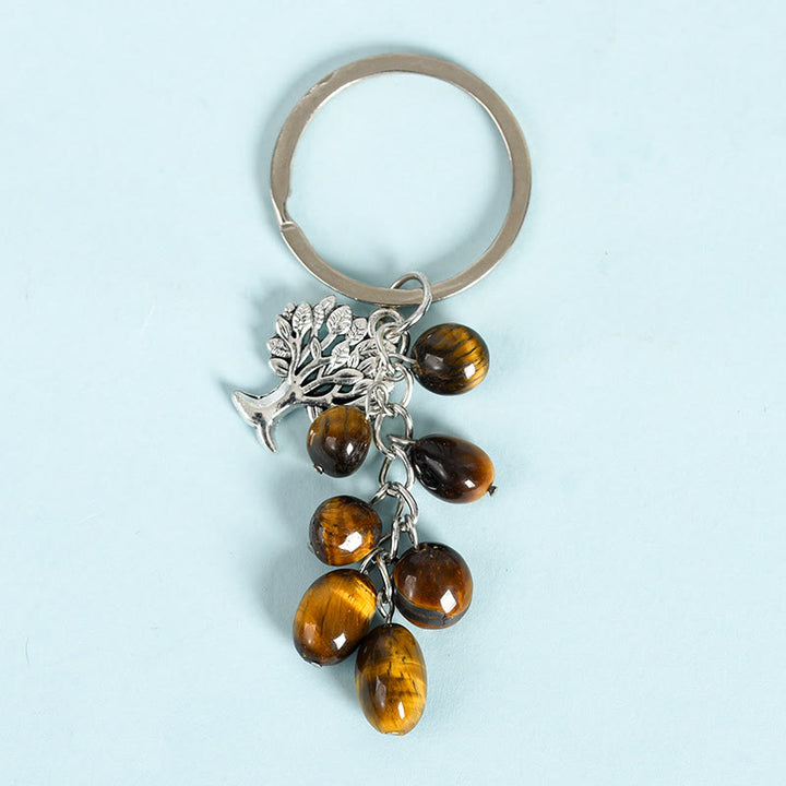 Llavero con piedra cruda natural de Olivenorma y árbol de la vida