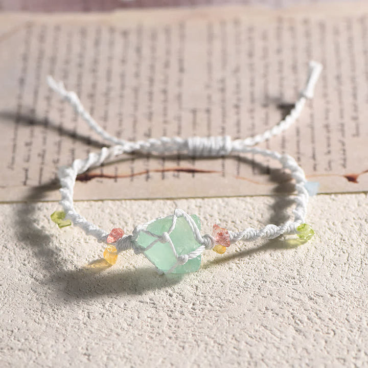 Pulsera trenzada con flores de cristal natural hecha a mano de Olivenorma 