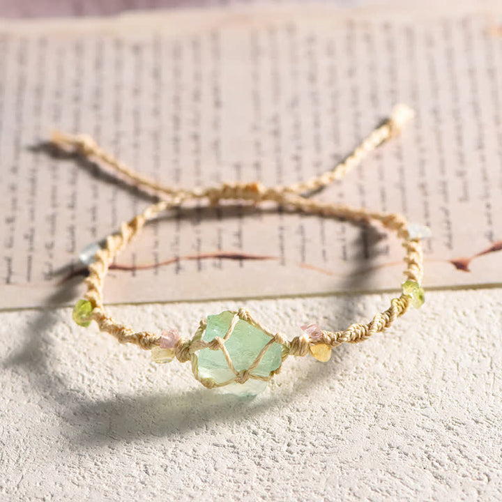 Pulsera trenzada con flores de cristal natural hecha a mano de Olivenorma 