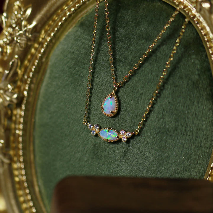 Pendientes y collar con colgante de gota de agua de ópalo natural de Olivenorma
