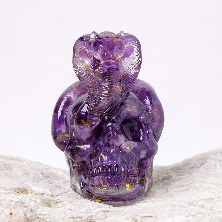Estatua de calavera de serpiente de piedra real de Olivenorma , decoración con piedras preciosas