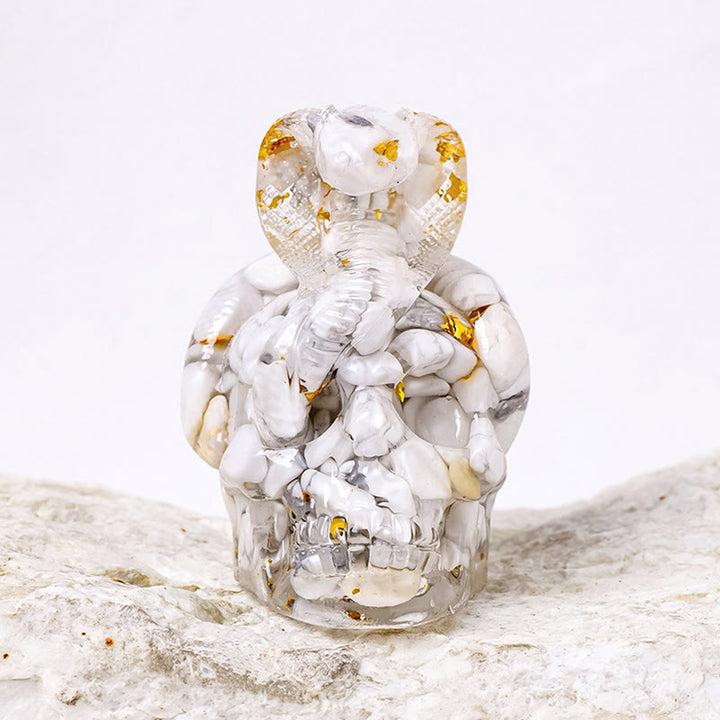 Estatua de calavera de serpiente de piedra real de Olivenorma , decoración con piedras preciosas