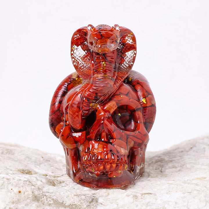 Estatua de calavera de serpiente de piedra real de Olivenorma , decoración con piedras preciosas