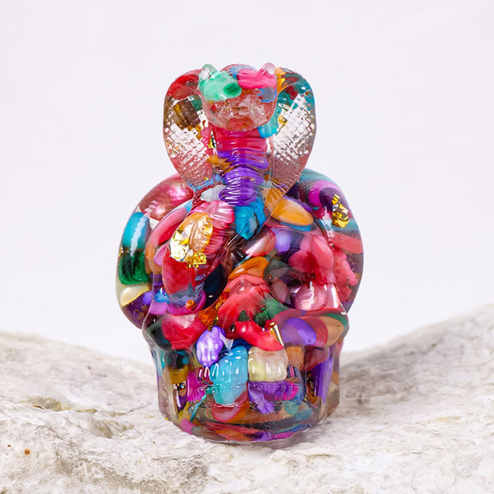Estatua de calavera de serpiente de piedra real de Olivenorma , decoración con piedras preciosas