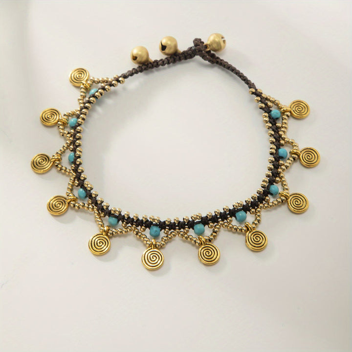 Tobillera tejida con borlas turquesas estilo boho de Olivenorma