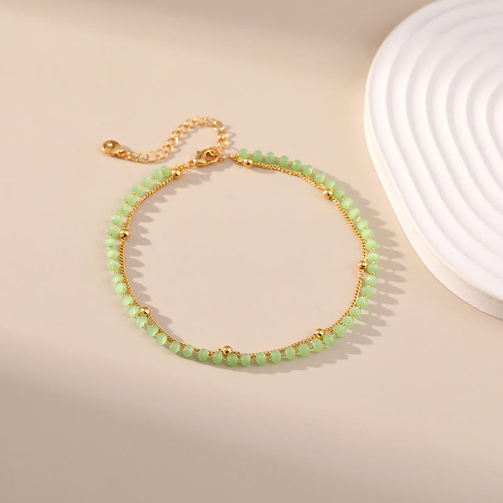 Tobillera con cuentas bañadas en oro y peridoto natural de Olivenorma