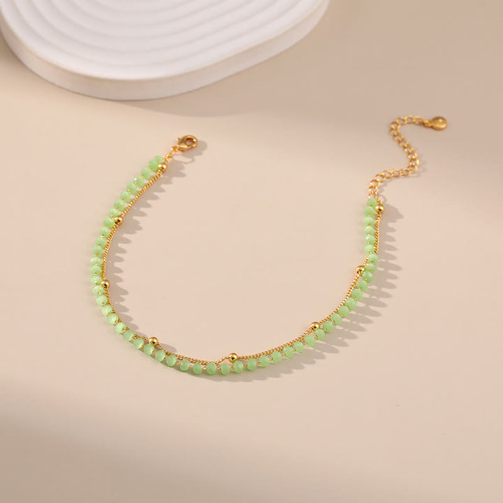 Tobillera con cuentas bañadas en oro y peridoto natural de Olivenorma