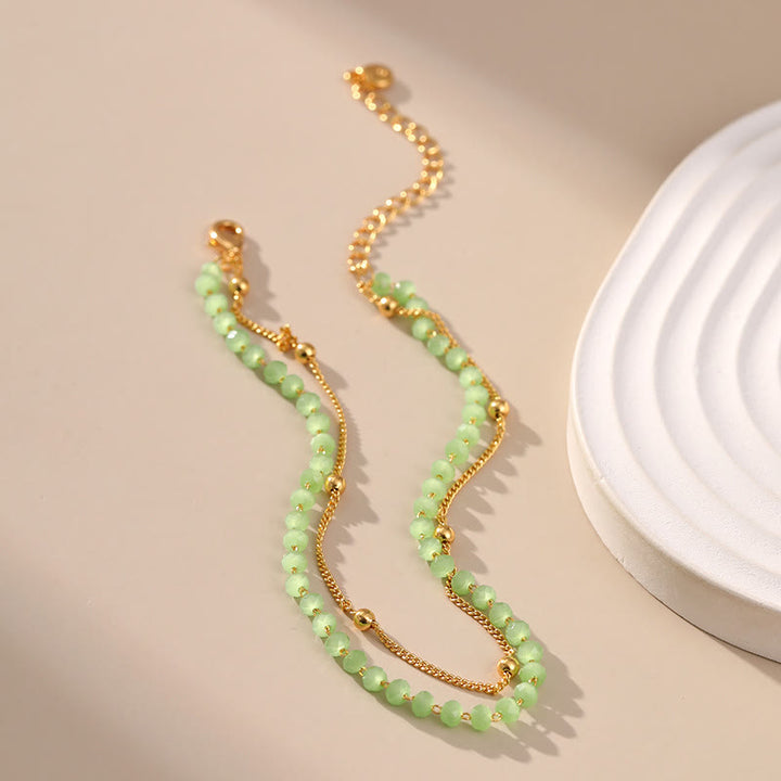 Tobillera con cuentas bañadas en oro y peridoto natural de Olivenorma