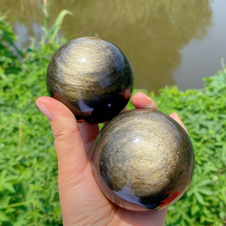 Esfera de cristal de obsidiana dorada natural de Olivenorma