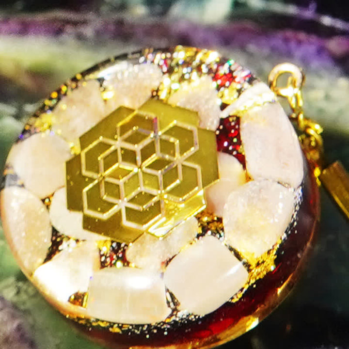 Collar de orgón con piedra solar y granate natural de Olivenorma